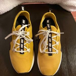 Yellow, black and white Nike for women.